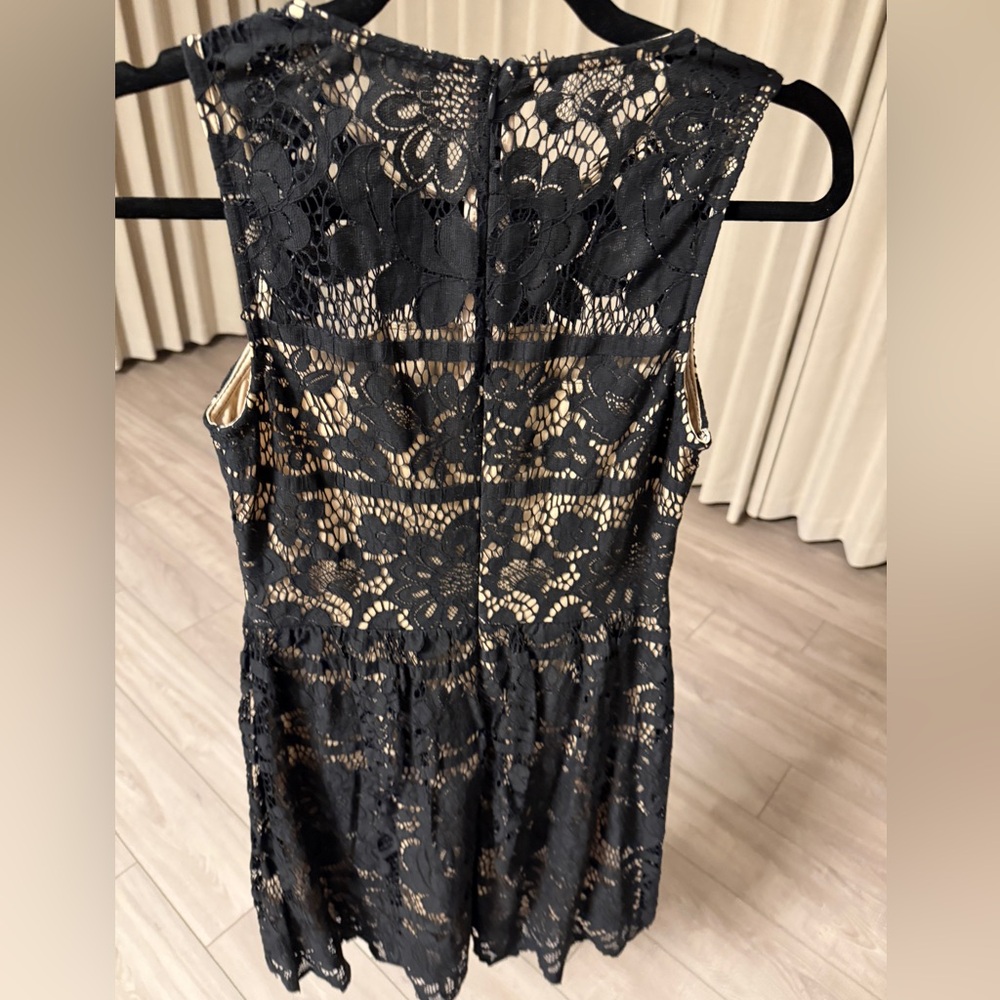 Selling this beautiful black laced dress